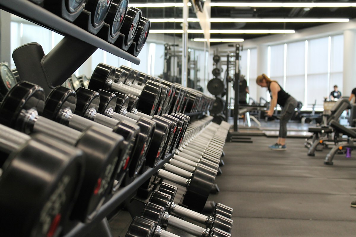 Members using cardio equipment at a partner gym