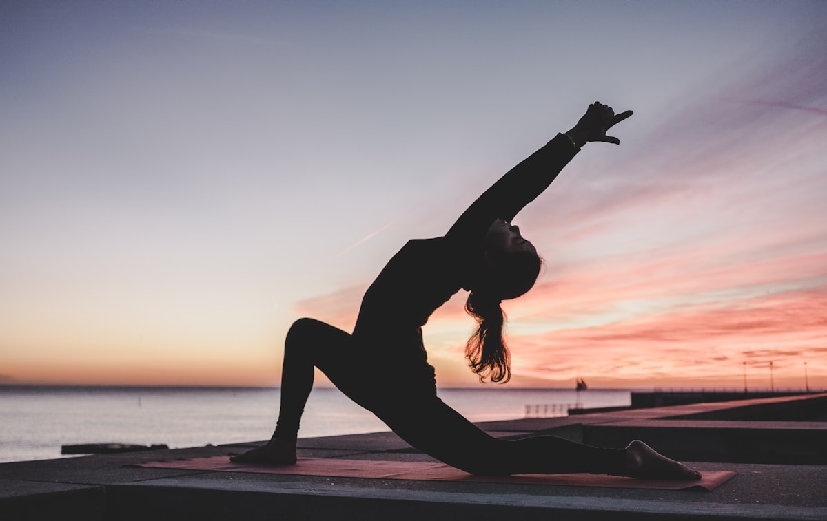 Employee practicing yoga in a class